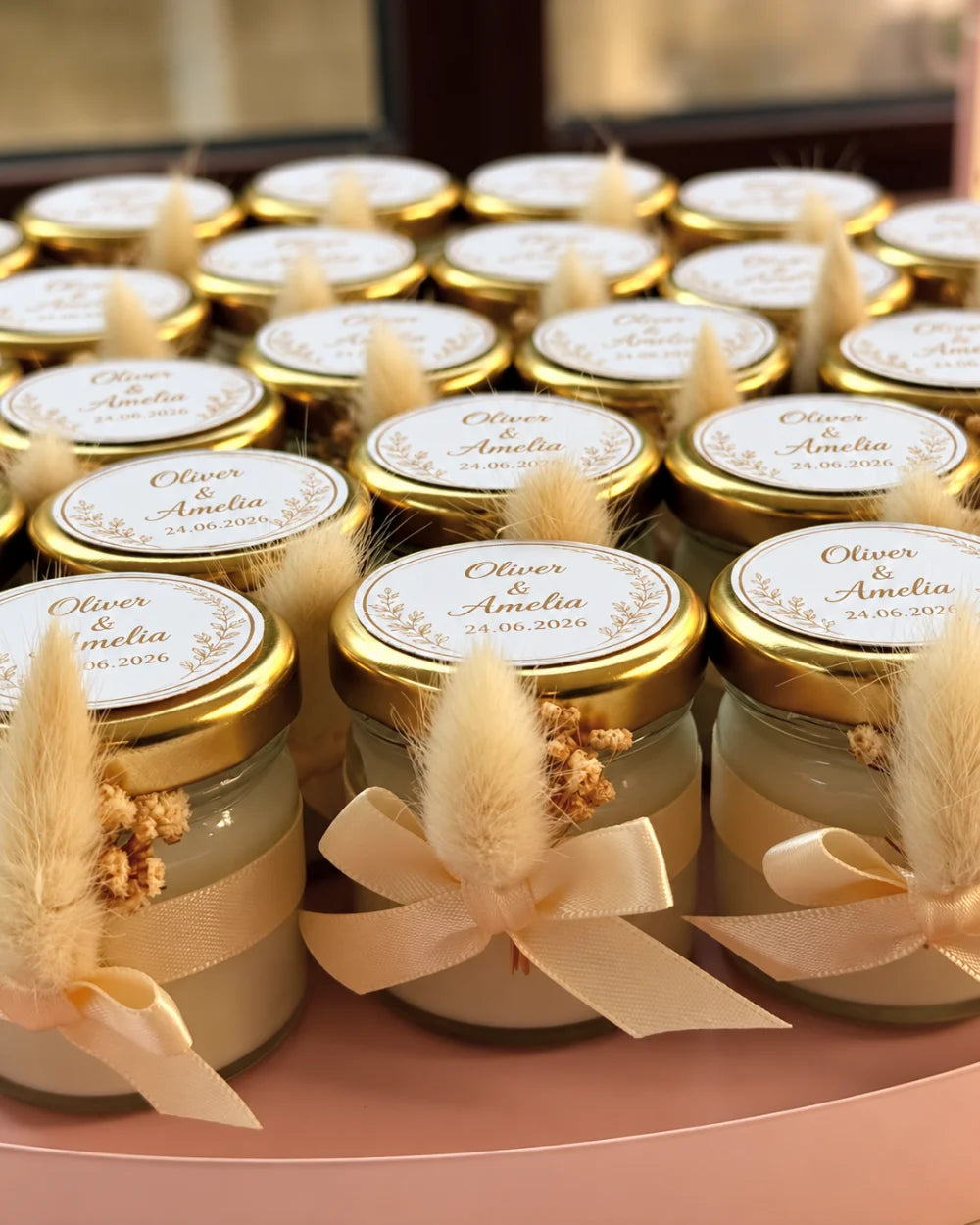 Personalised wedding candle favours with gold lids, dried flowers and ivory ribbon