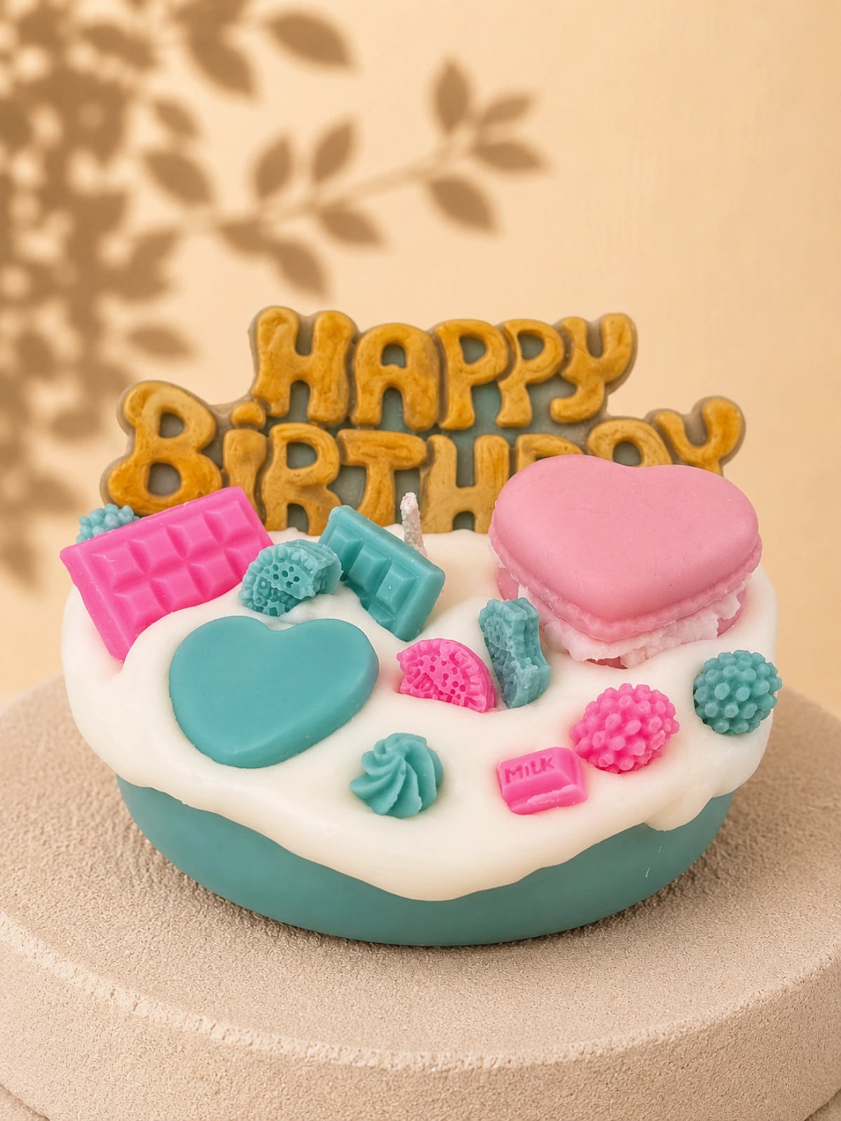 Turquoise Crush Happy Birthday pillar candle decorated with colourful sweets